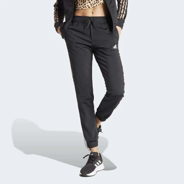 CALÇA ADIDAS JUSTA MALHA AFUNILADA ESTAMPA ANIMAL ESSENTIALS TRÊS LISTRAS FEMININA - Preto/marrom