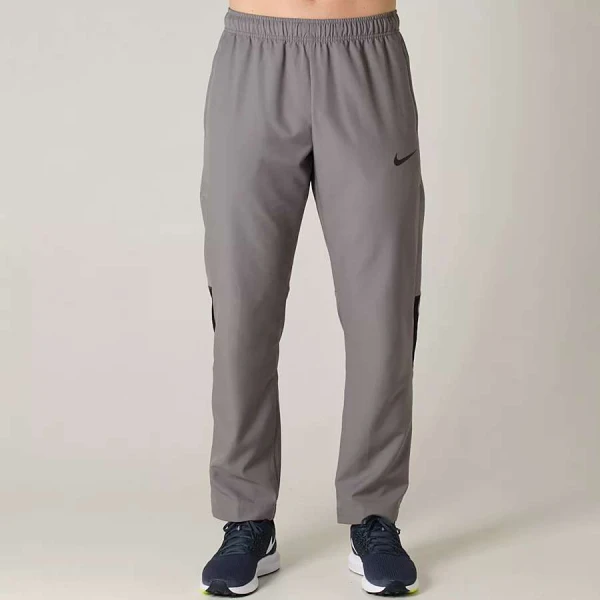 CALÇA NIKE DRY PANT TEAM WOVEN MASCULINA - Cinza CALÇA NIKE DRY PANT TEAM WOVEN MASCULINA - Cinza