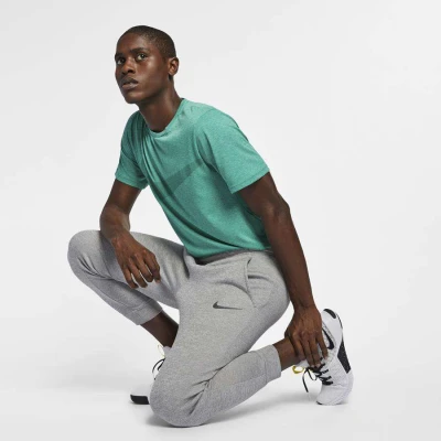 CALÇA NIKE THERMA MASCULINA - Cinza CALÇA NIKE THERMA MASCULINA - Cinza