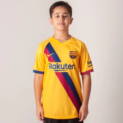 CAMISA NIKE BARCELONA OFICIAL 2 2019/20 SEM NÚMERO INFANTIL - Amarelo CAMISA NIKE BARCELONA OFICIAL 2 2019/20 SEM NÚMERO INFANTIL - Amarelo